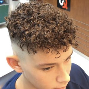 boy with tight curl perm GQ Men's Hair LoungeBest Barber shop